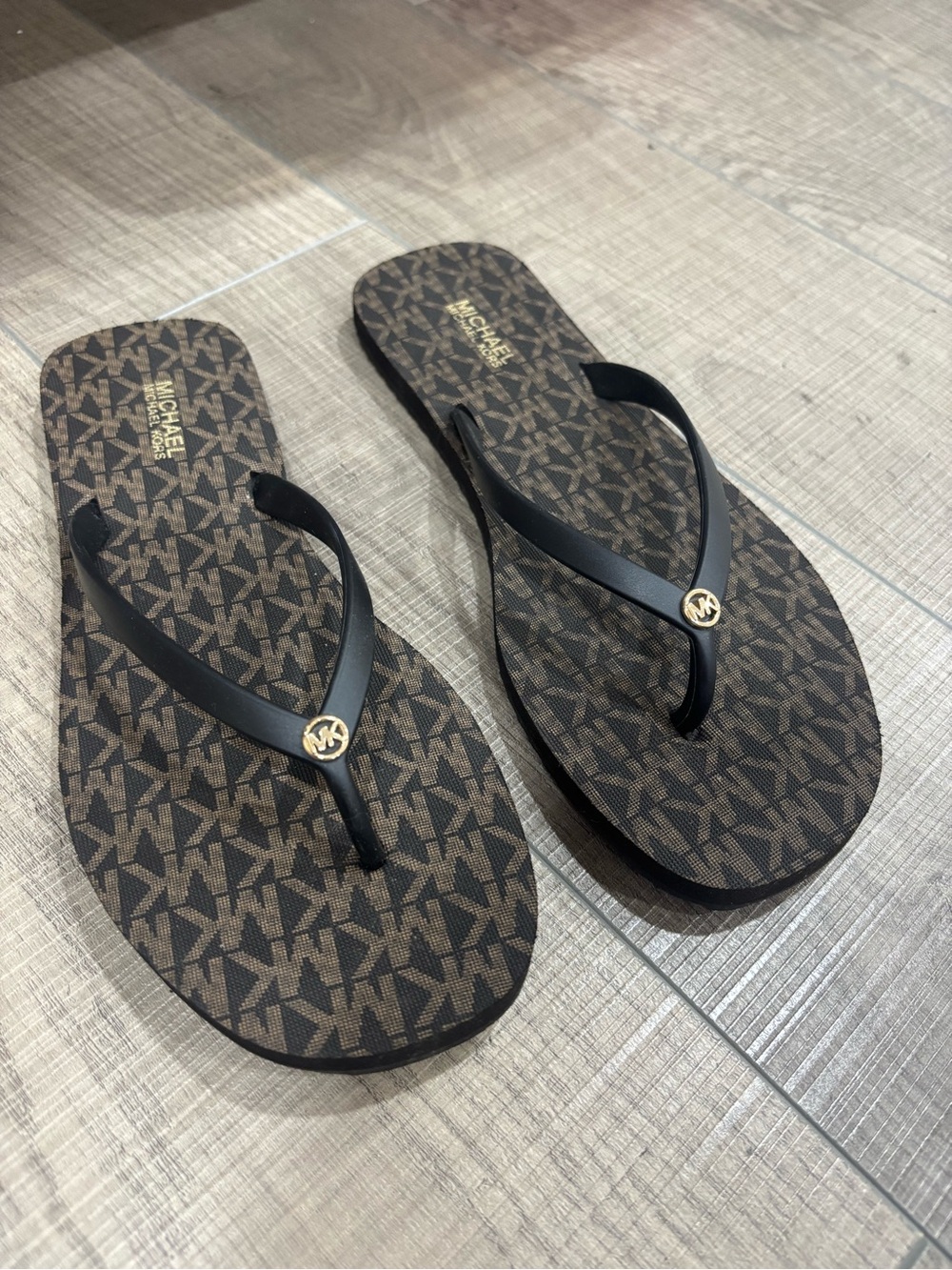 Michael Kors Brown MK Print Flip Flop Sandals with Black Straps